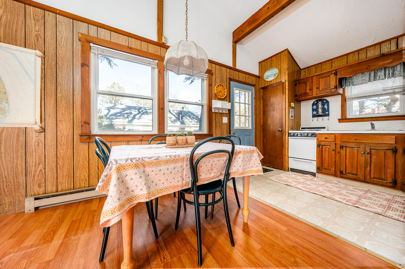 60 Long Avenue, Unit E Wellfleet, MA 02667 - Photo 7 of 22 a view of a dining room with furniture window and wooden floor