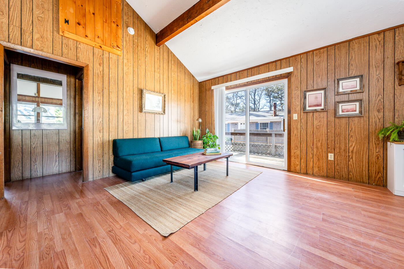 60 Long Avenue, Unit E Wellfleet, MA 02667 - Photo 9 of 22 a living room with wooden floor and a window