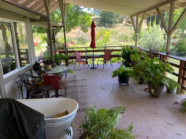 a view of a lake with a yard