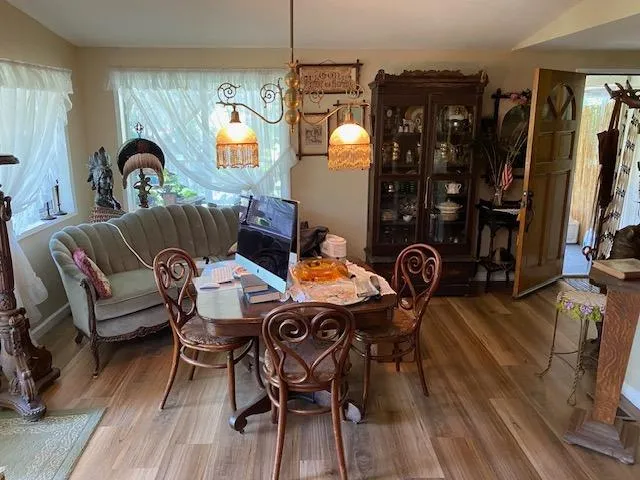 a view of bathroom with a sink and mirror