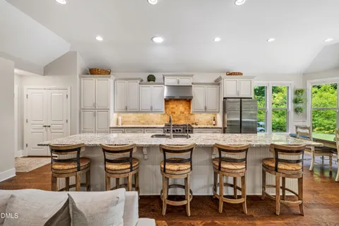 $975,000 | 212 Middlegreen Place, Holly Springs, NC 27540