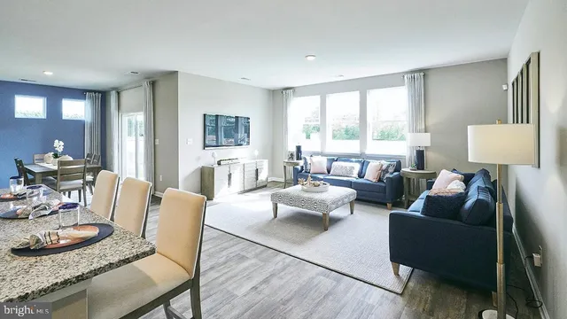 a kitchen with sink stove and cabinets