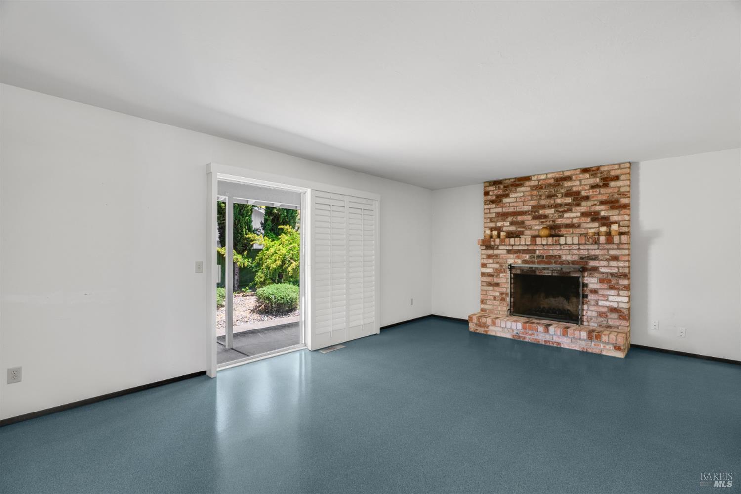 2904 Jason Drive Santa Rosa, CA 95405 - Photo 11 of 33 an empty room with windows and fireplace