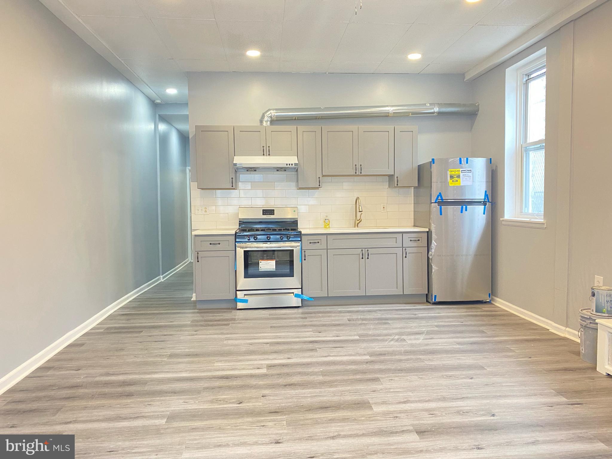 2013 South 5th Street Philadelphia, PA 19148 - Photo 3 of 16 Modern kitchen with sleek finishes.