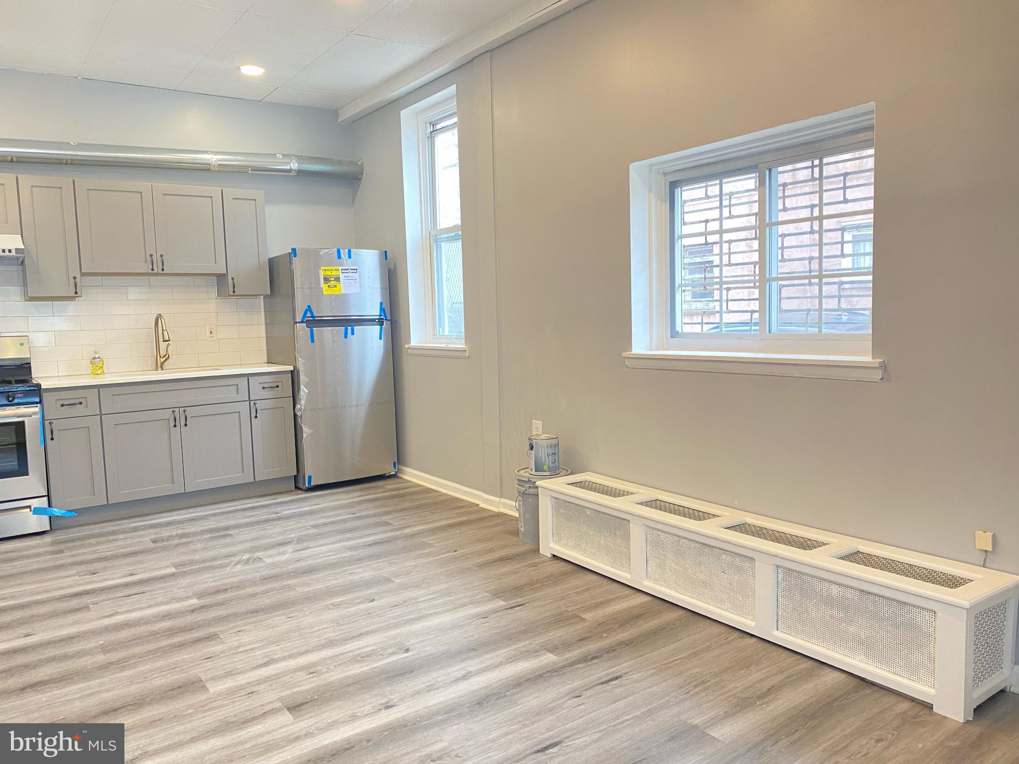 2013 South 5th Street Philadelphia, PA 19148 - Photo 4 of 16 Bright and airy kitchen with modern finishes.