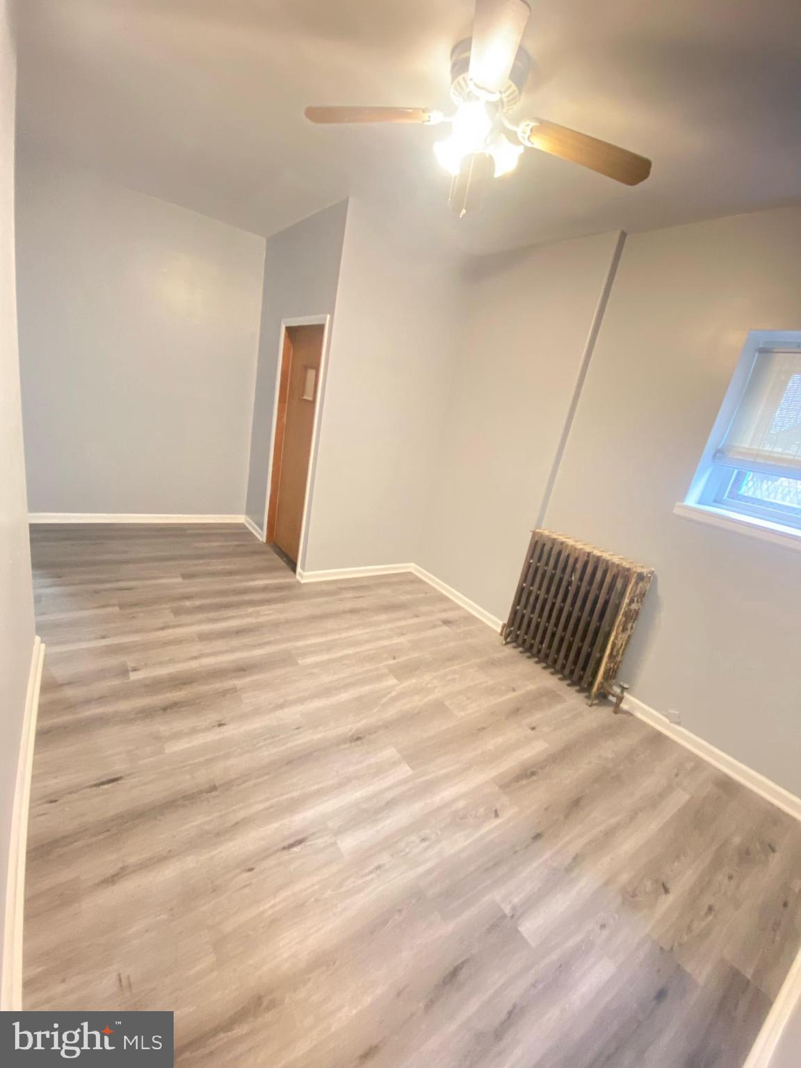 2013 South 5th Street Philadelphia, PA 19148 - Photo 5 of 16 Bright and airy room with modern flooring.