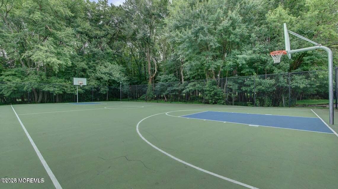57 Chestnut Way Manalapan, NJ 07726 - Photo 9 of 20 a view of a tennis court