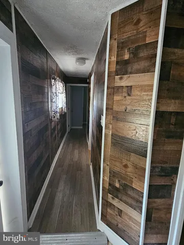 a view of staircase with wooden floor