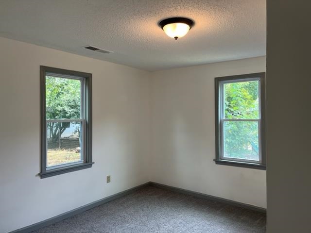 3786 Longfellow Road Memphis, TN 38108 - Photo 6 of 15 an empty room with a window