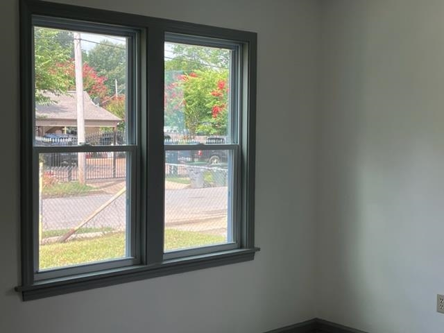 3786 Longfellow Road Memphis, TN 38108 - Photo 9 of 15 a view of an empty room and window
