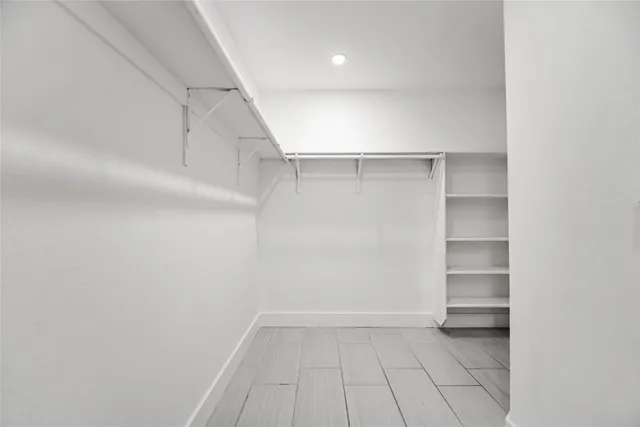 a view of an empty walk in closet