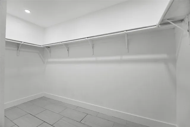 a view of an empty walk in closet