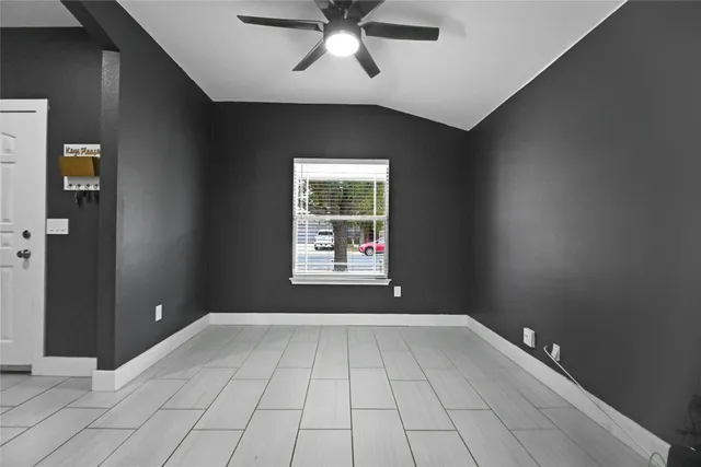 a view of an empty room and window