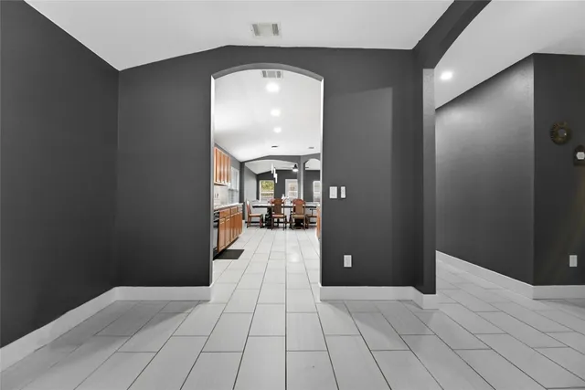 wooden floor with a bathroom