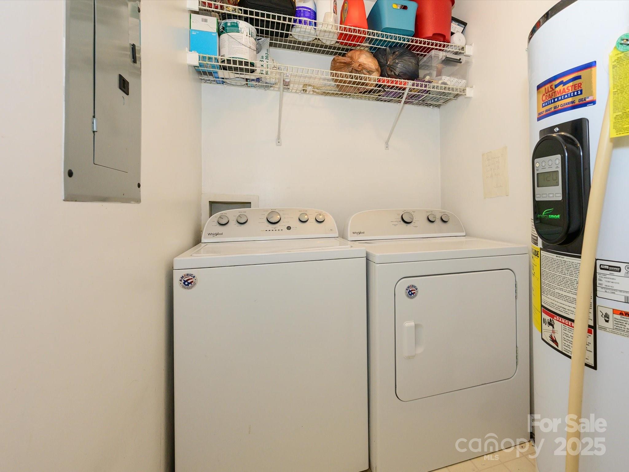 10005 Graduate Lane, Unit K Charlotte, NC 28262 - Photo 24 of 25 a utility room with dryer and washer