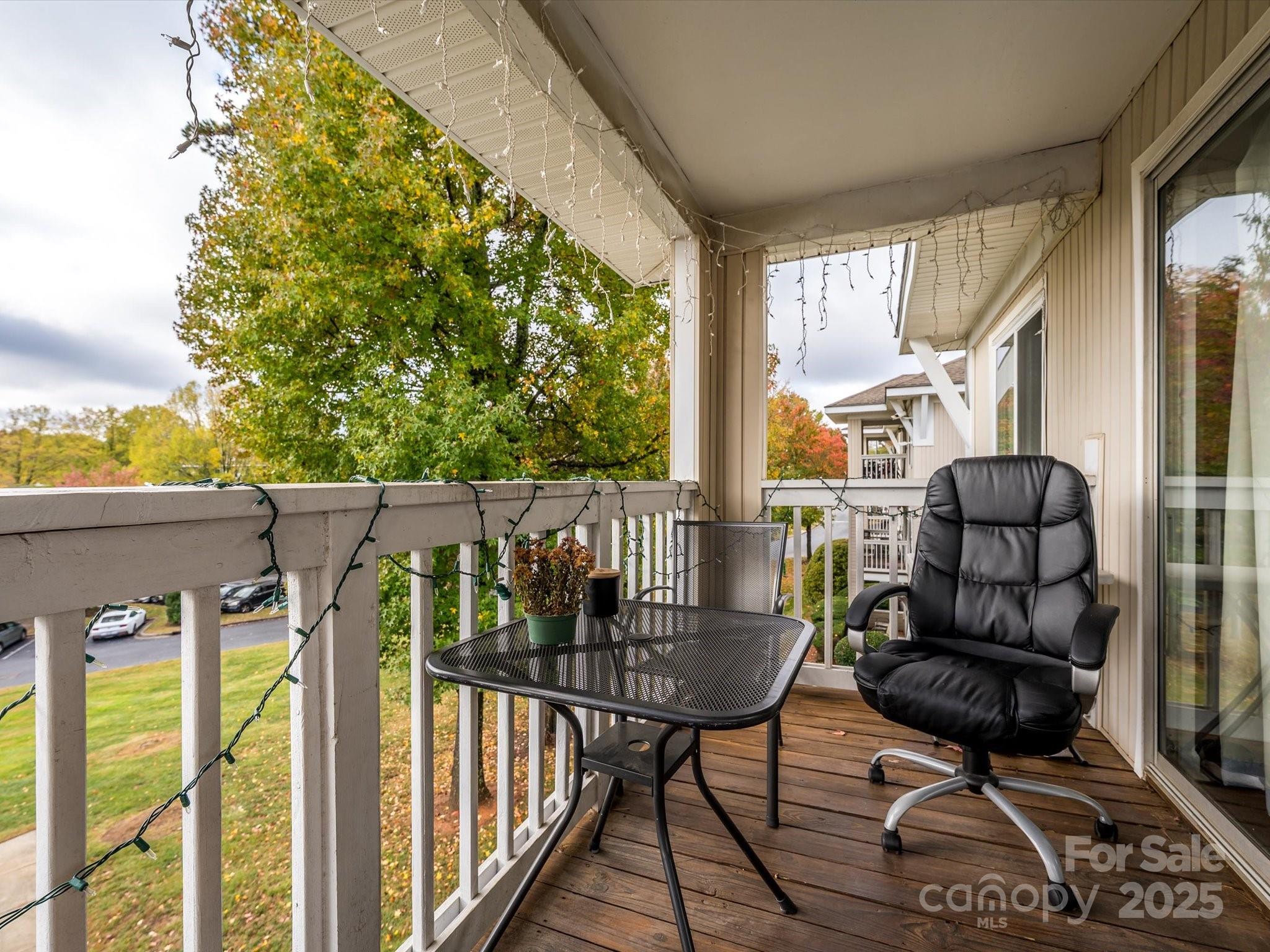 10005 Graduate Lane, Unit K Charlotte, NC 28262 - Photo 25 of 25 a balcony view with a seating space