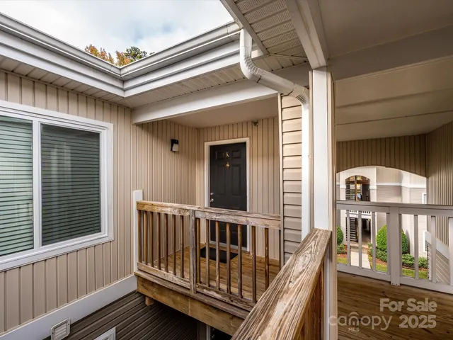 a view of balcony with a deck