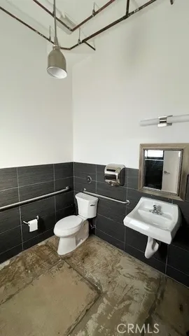 a living room with a couch and a flat screen tv