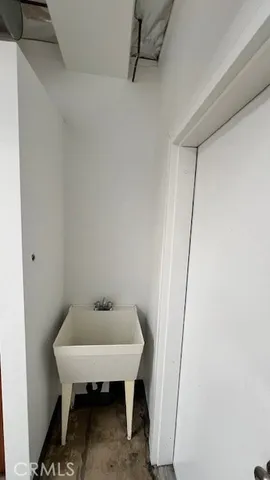 a bathroom with a sink and window