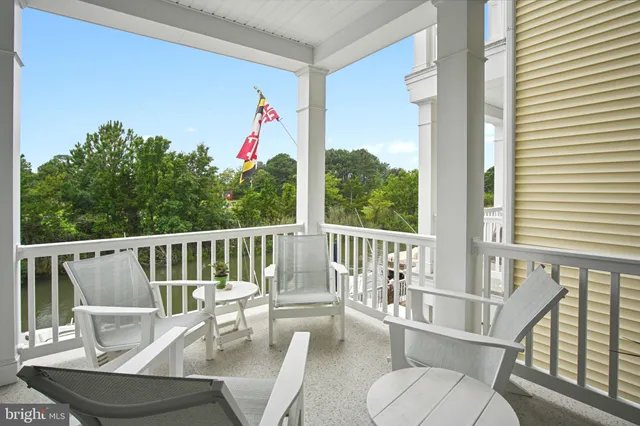 a view of porch with a furniture