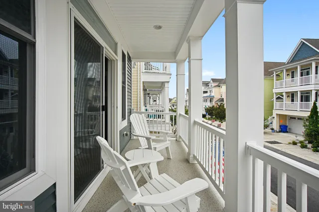 a room with a bed and a chandelier