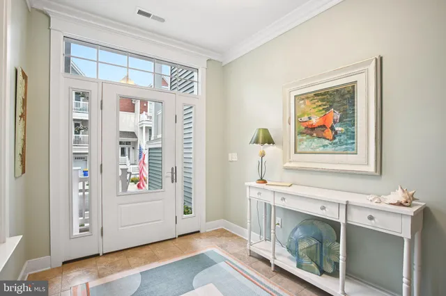 a view of front door with wooden floor