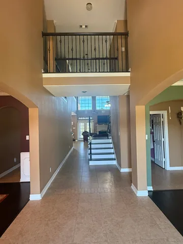 a kitchen with sink stove and cabinets