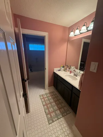 a view of a livingroom with furniture and windows