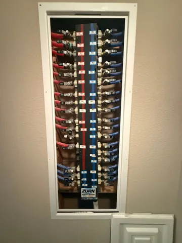 wooden floor with cabinet and mirror