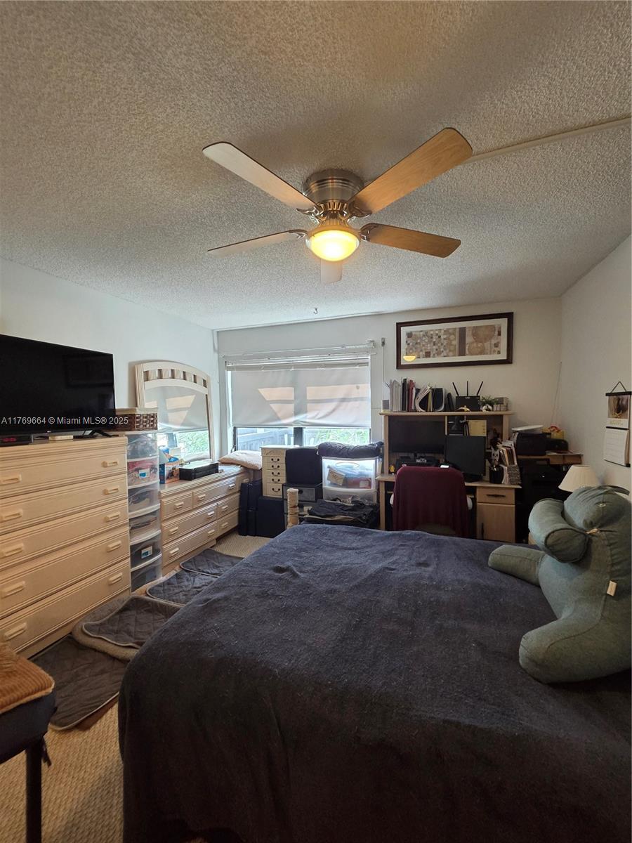 1021 Mockingbird Lane, Unit 411 Plantation, FL 33324 - Photo 17 of 42 Primary bedroom