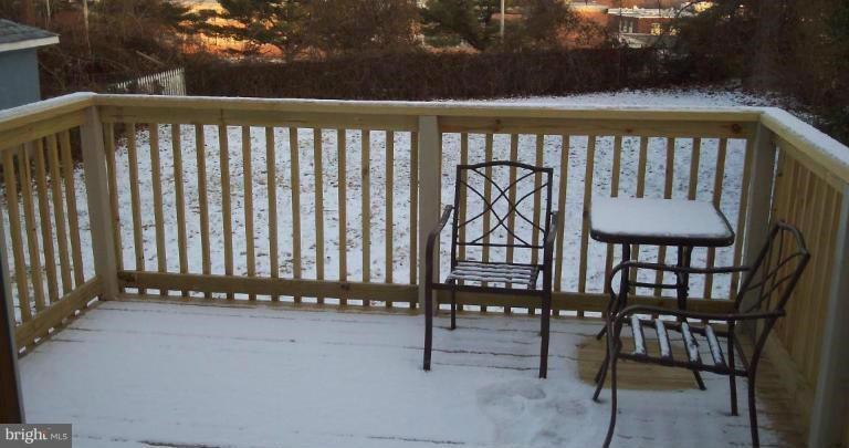 5315 Brabant Road Baltimore, MD 21229 - Photo 14 of 16 a view of a chairs and table in the balcony