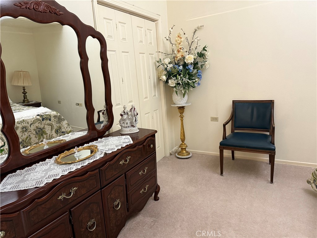 1441 Homewood Road Seal Beach, CA 90740 - Photo 16 of 25 a living room with furniture and a potted plant