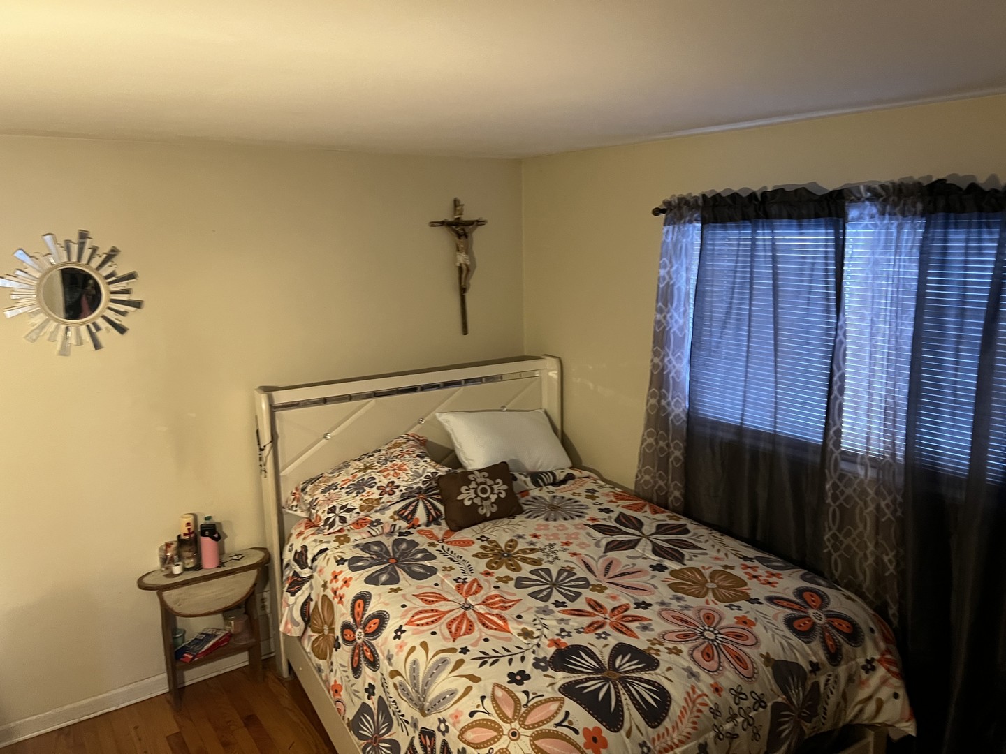 1105 Indian Avenue Aurora, IL 60505 - Photo 20 of 35 a bedroom with a bed and wooden floor