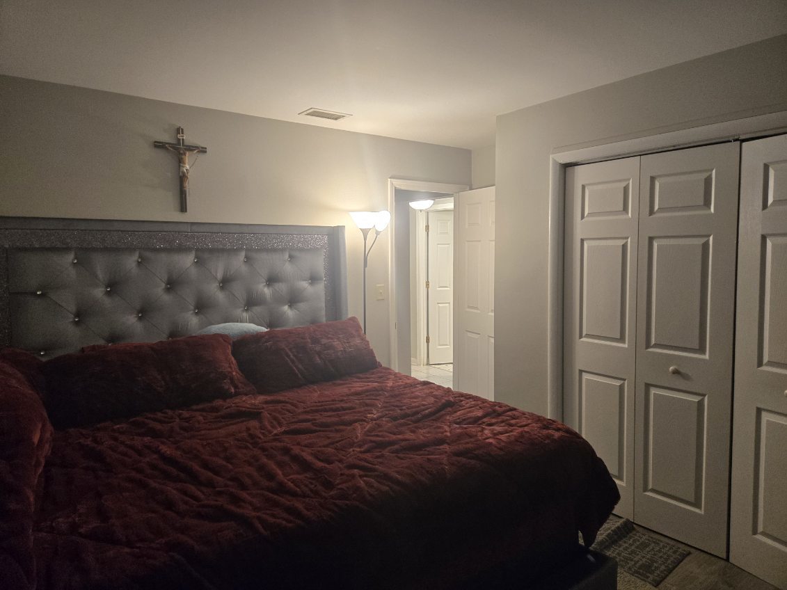 1105 Indian Avenue Aurora, IL 60505 - Photo 25 of 35 a bedroom with a bed and a window