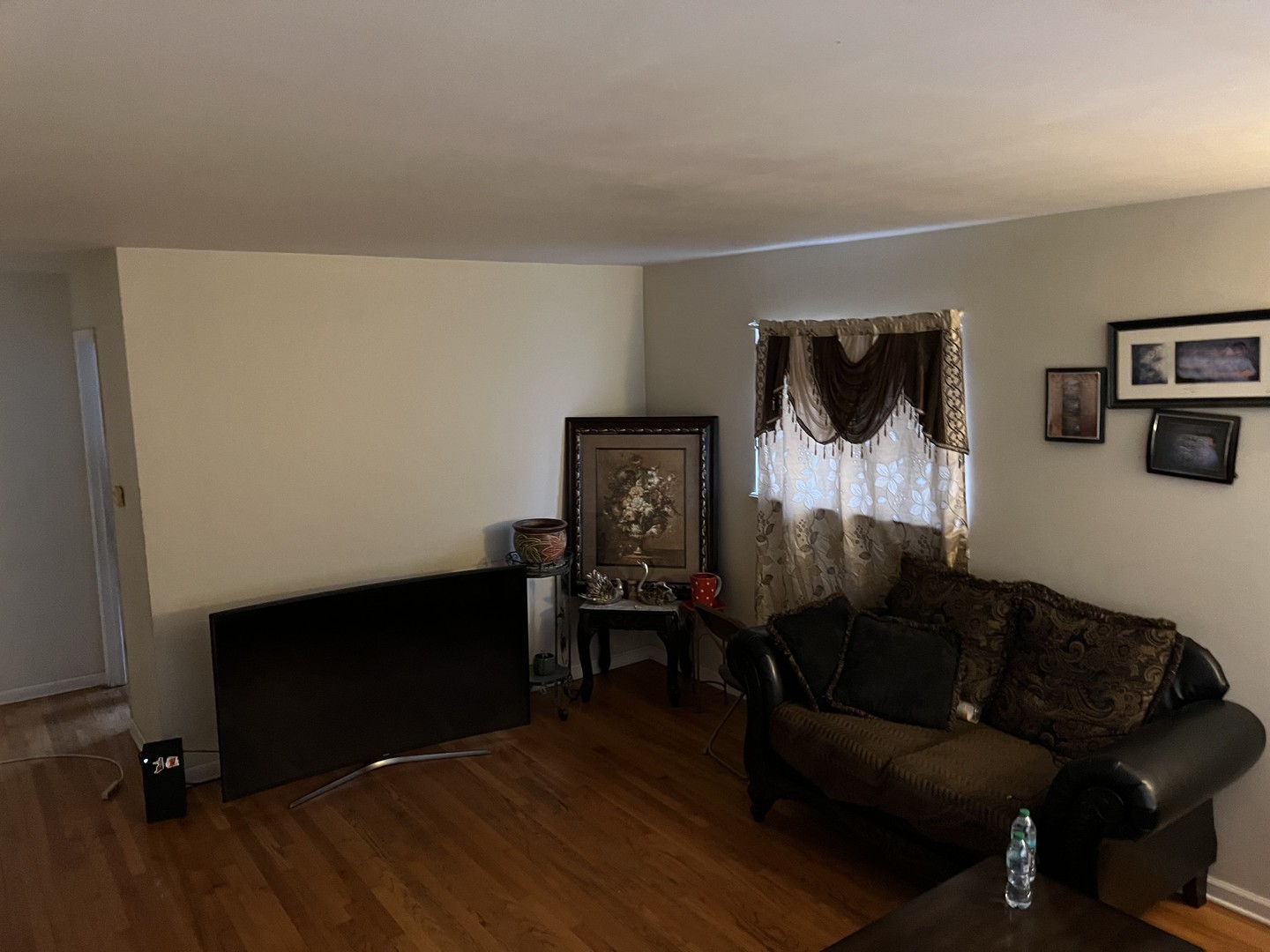 1105 Indian Avenue Aurora, IL 60505 - Photo 3 of 35 a living room with furniture and a wooden floor