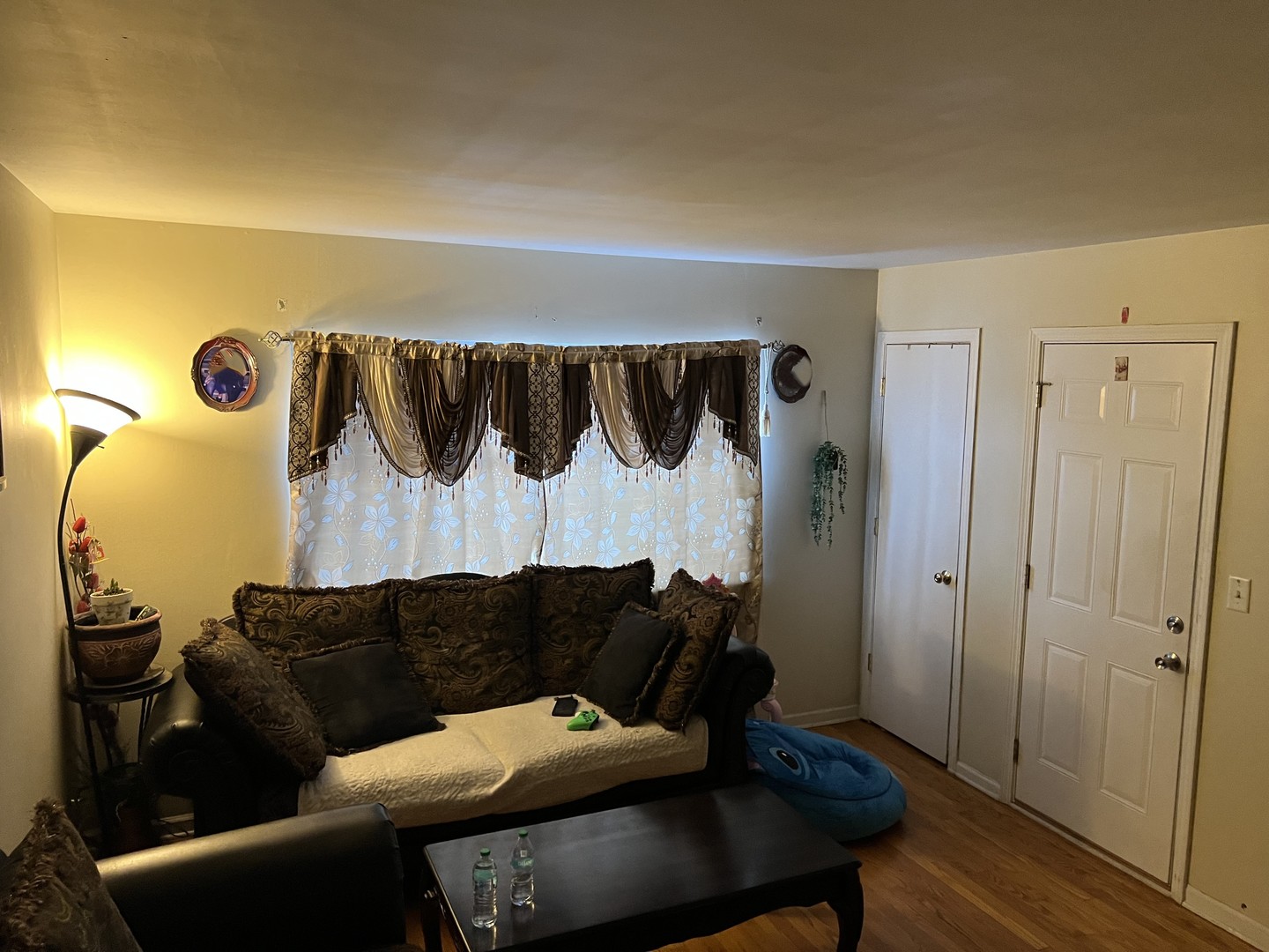 1105 Indian Avenue Aurora, IL 60505 - Photo 4 of 35 a living room with a couch and a table