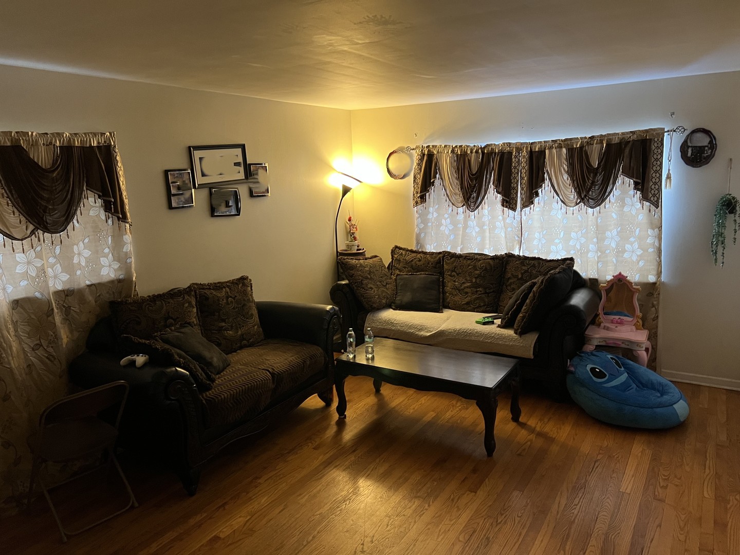1105 Indian Avenue Aurora, IL 60505 - Photo 5 of 35 a living room with furniture and a wooden floor
