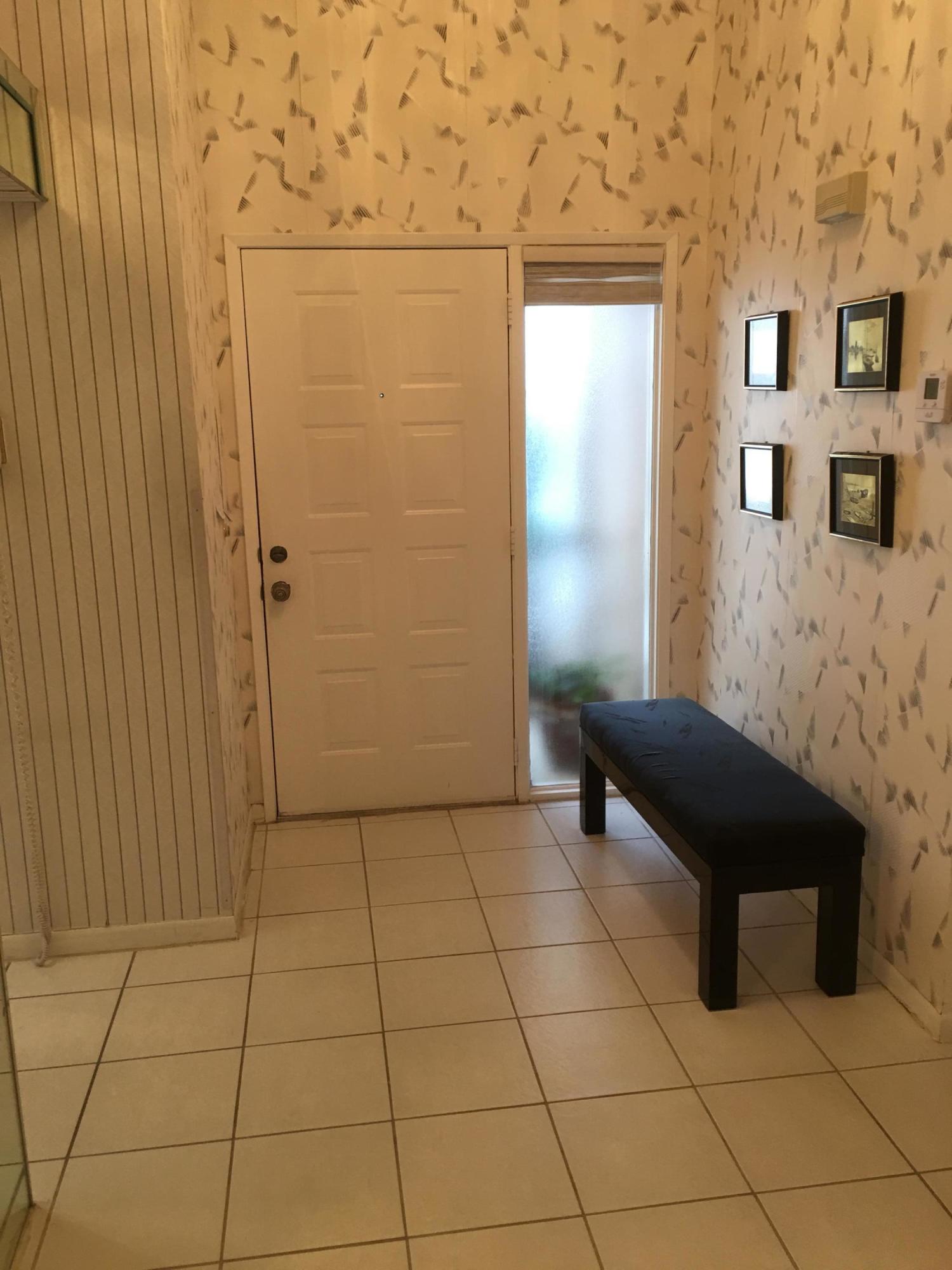8359 Springlake Drive, Unit A Boca Raton, FL 33496 - Photo 3 of 26 FOYER