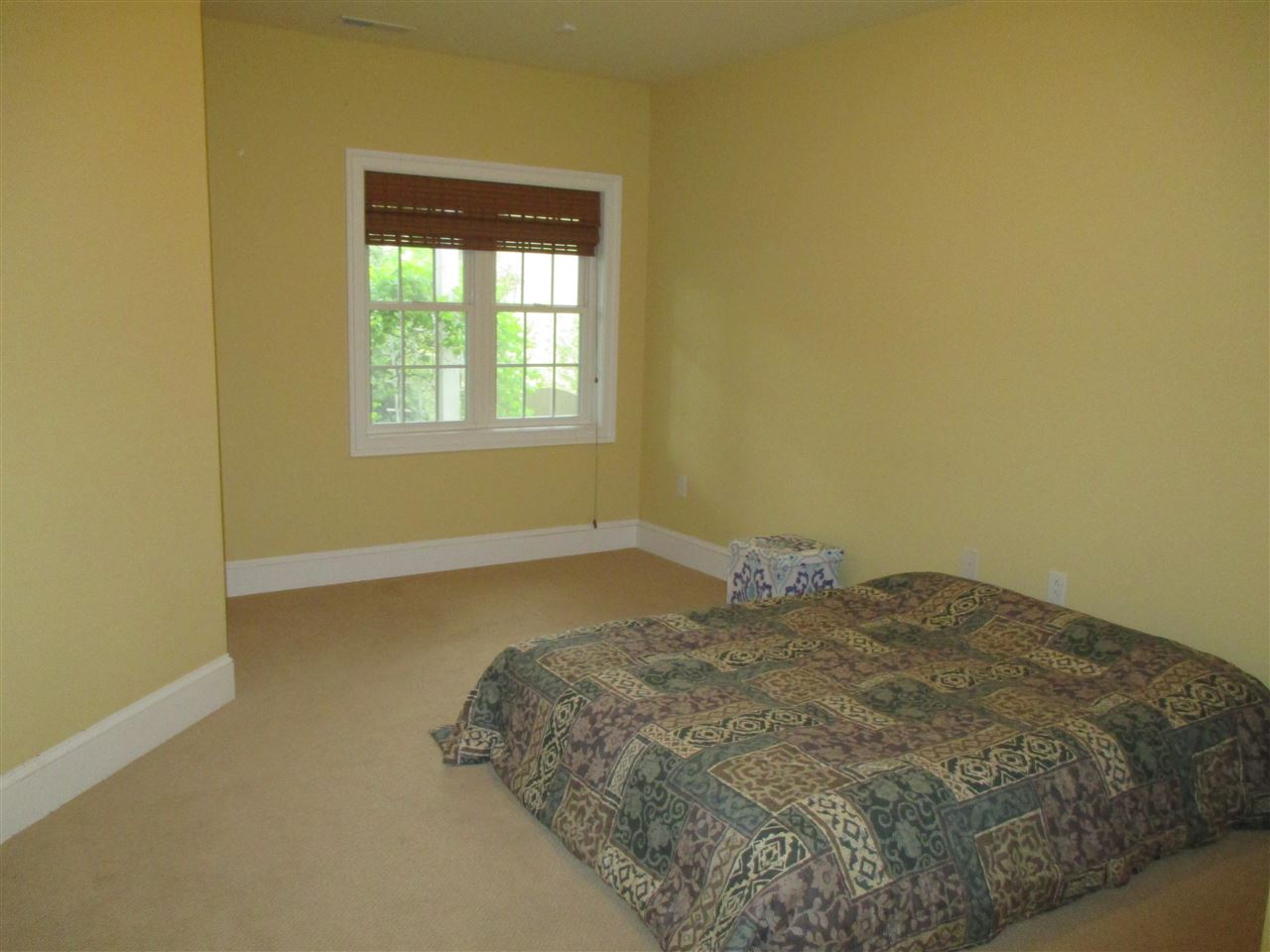 121 A Overlook Road Staunton, VA 24401 - Photo 17 of 21 a bed sitting in a bedroom next to a window