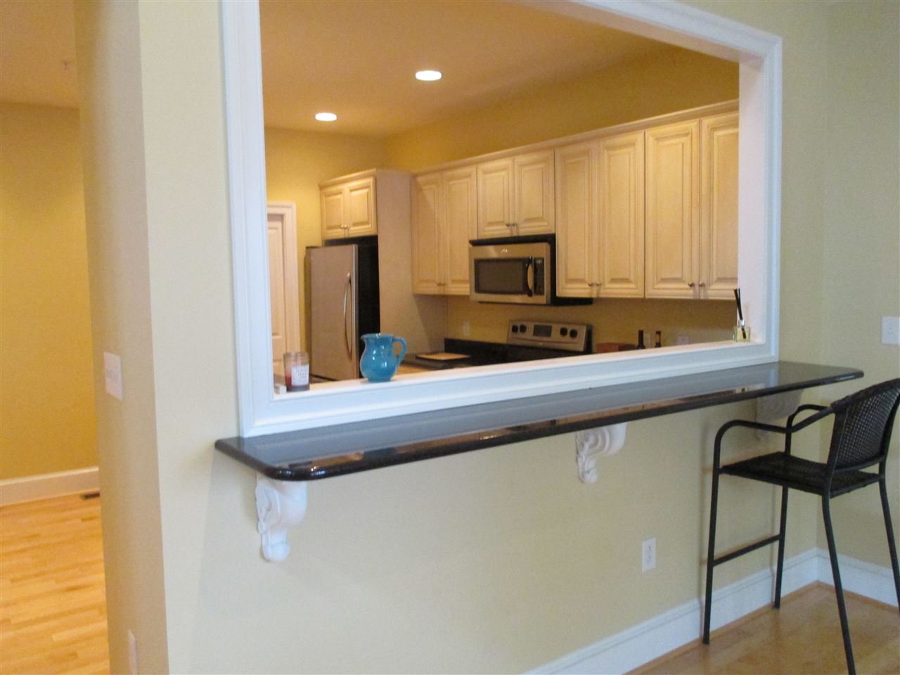121 A Overlook Road Staunton, VA 24401 - Photo 4 of 21 a kitchen with stainless steel appliances granite countertop a stove a sink and a microwave