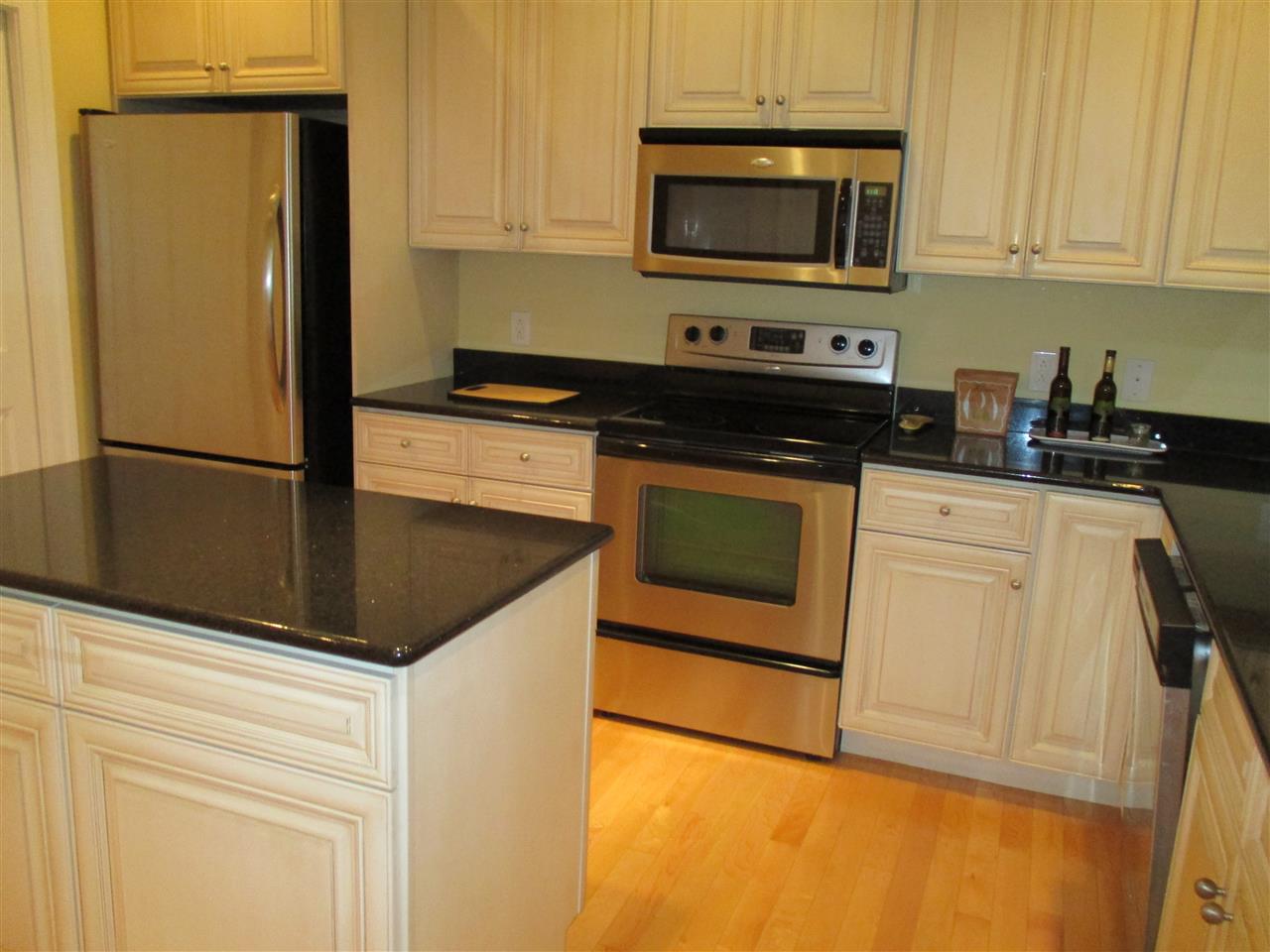 121 A Overlook Road Staunton, VA 24401 - Photo 6 of 21 a kitchen with granite countertop cabinets stainless steel appliances and a counter space