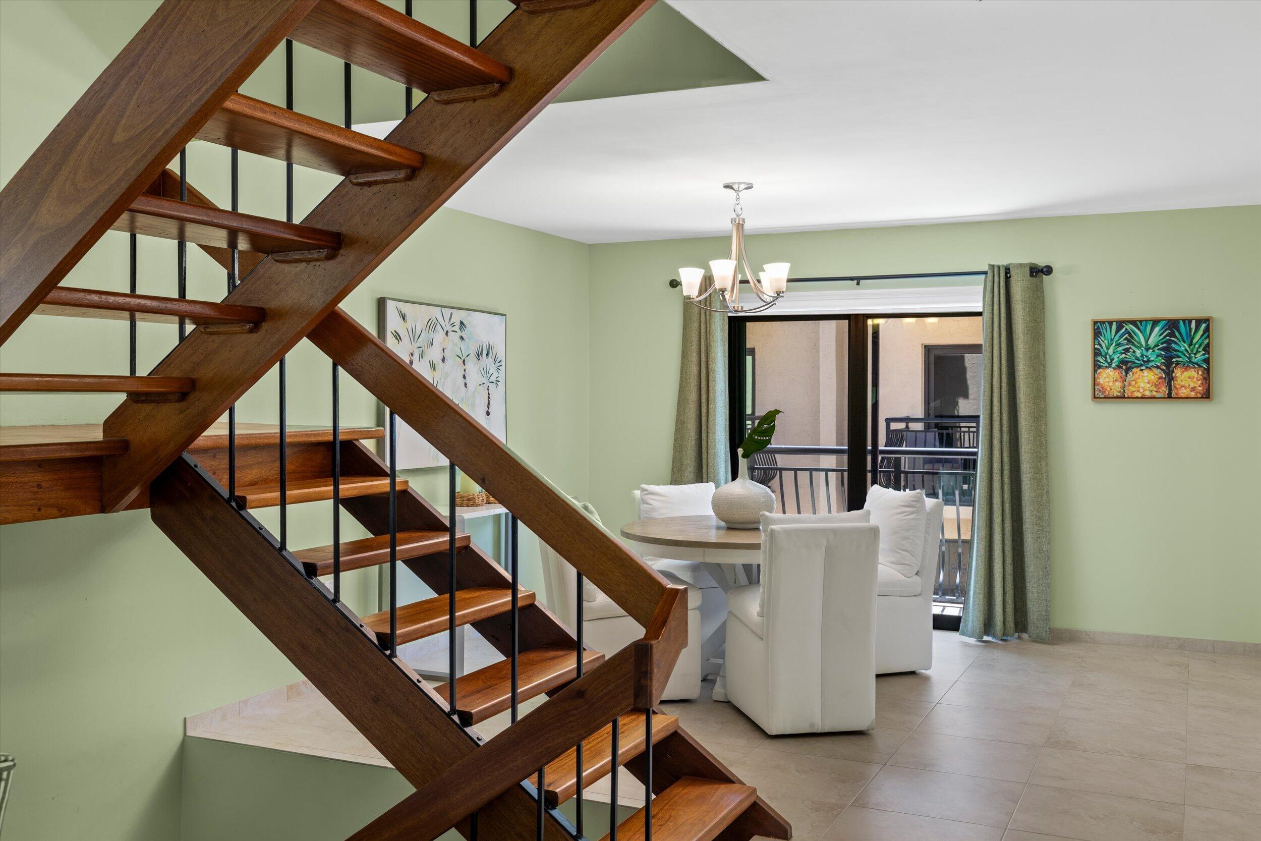 1616 Atlantic Boulevard, Unit 13 Key West, FL 33040 - Photo 11 of 38 a view of an entryway and livingroom with furniture