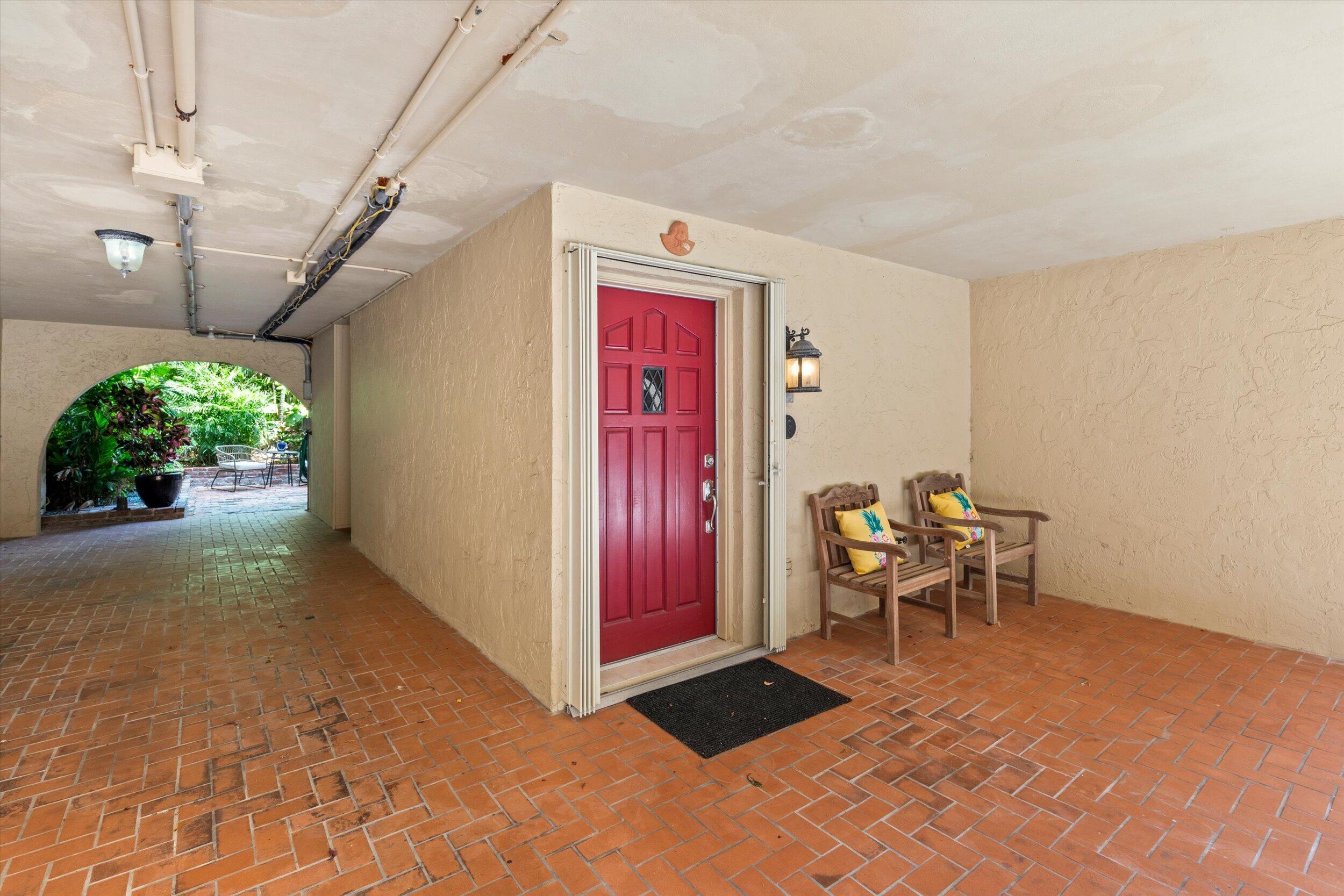 1616 Atlantic Boulevard, Unit 13 Key West, FL 33040 - Photo 26 of 38 a very nice looking room with a bench