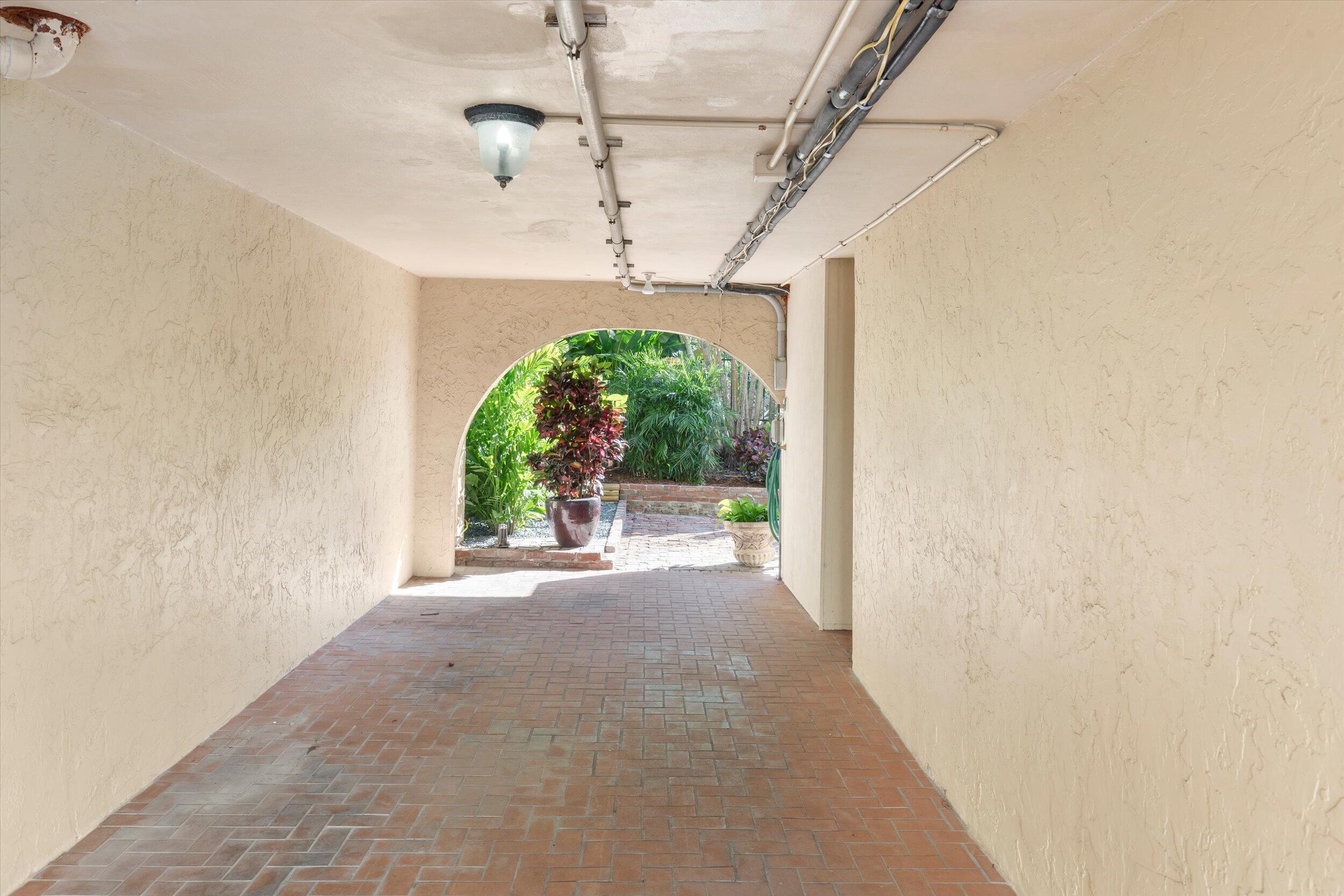 1616 Atlantic Boulevard, Unit 13 Key West, FL 33040 - Photo 36 of 38 a view of a porch and a window