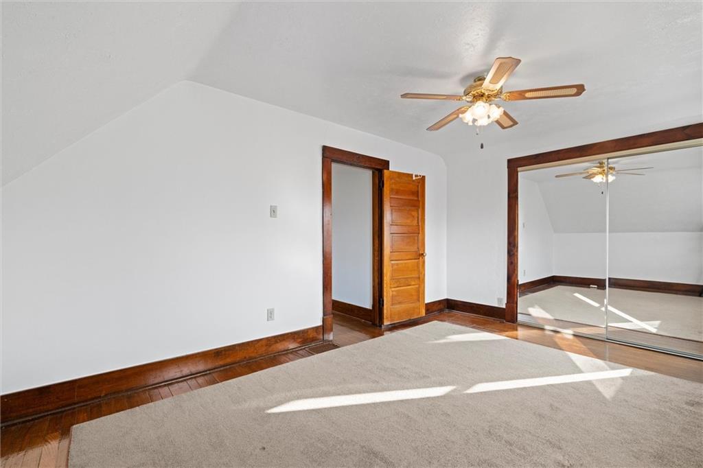 180 Center Street Springdale, PA 15144 - Photo 11 of 30 a view of a livingroom with a chandelier and a window