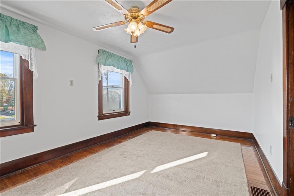 180 Center Street Springdale, PA 15144 - Photo 12 of 30 a view of a room with window and ceiling fan