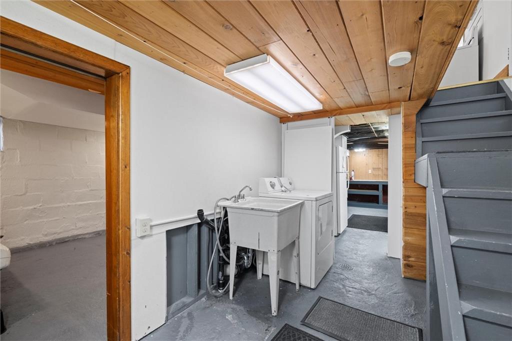 180 Center Street Springdale, PA 15144 - Photo 17 of 30 a utility room with dryer and washer