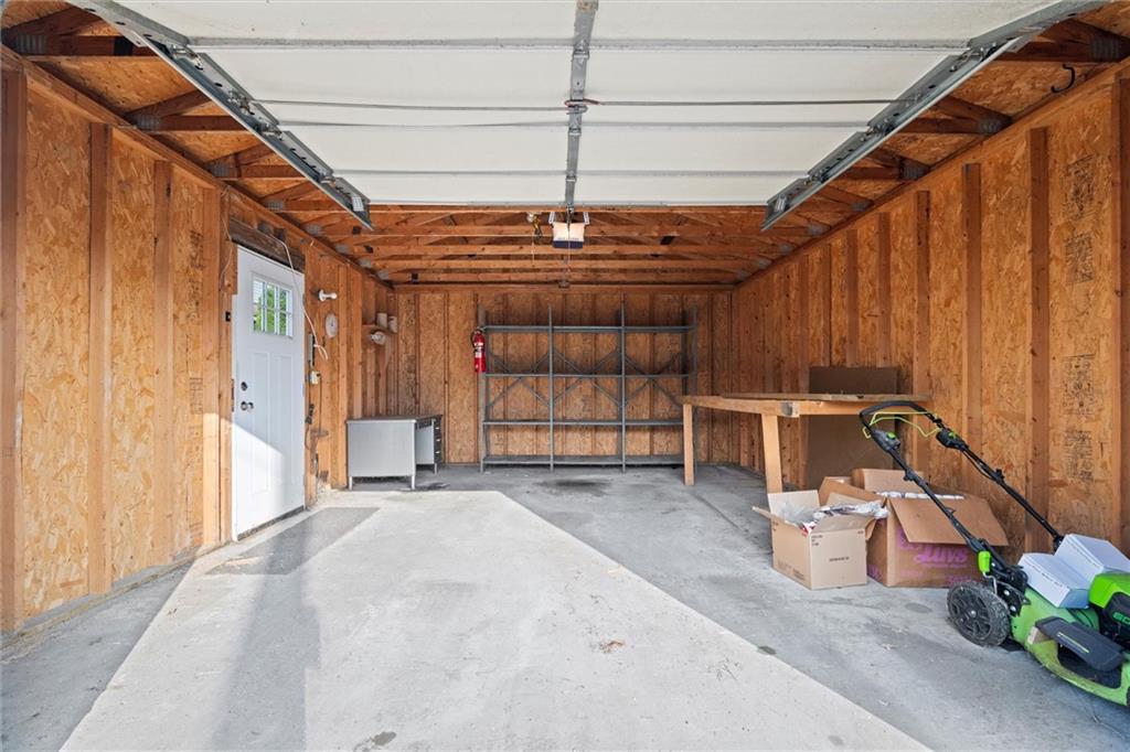 180 Center Street Springdale, PA 15144 - Photo 25 of 30 a view of a room with wooden walls and stairs