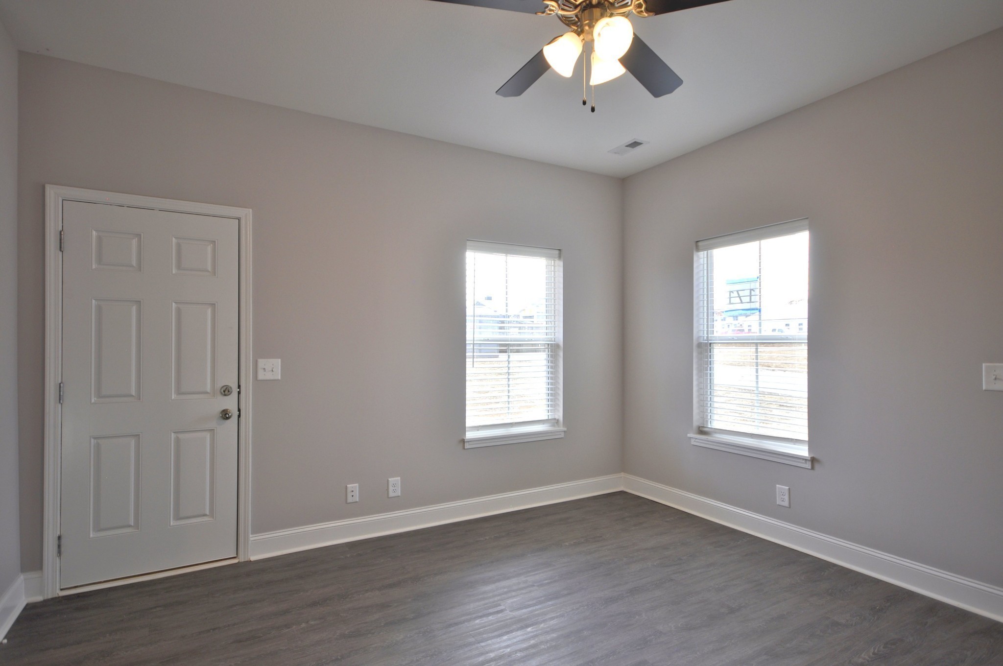 176 Bainbridge Drive, Unit B Clarksville, TN 37043 - Photo 5 of 31 a view of an empty room with a window and chandelier fan