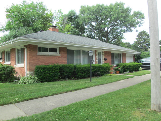 642 Wesley Drive Park Ridge, IL 60068 - Photo 1 of 11 a front view of a house with a yard